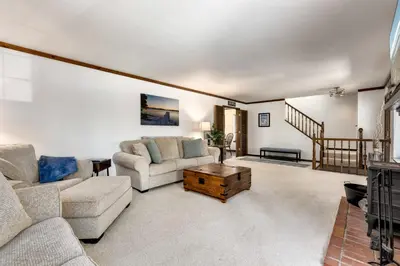 a living room with two couches and a coffee table at Large Seasonal Rental South Lake Tahoe in South Lake Tahoe