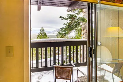 a balcony with a view of a snow covered mountain at Walk to Ski Lift Mtn-View Condo in Mammoth Lakes in Mammoth Lakes