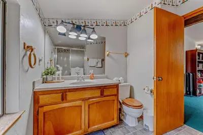 a bathroom with a sink and a toilet at Near Northstar Wooded Retreat with Deck & Loft in Tahoe Vista