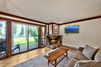 a living room with a couch and a fireplace at TML 04 - Beautiful 1 BR Condo in Tahoe City in Tahoe City