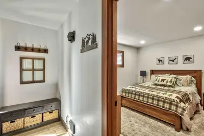 a bedroom with a bed and a television in it at TML 04 - Beautiful 1 BR Condo in Tahoe City in Tahoe City