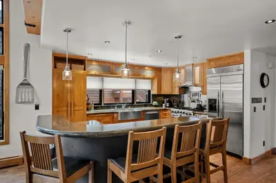 a kitchen with a large island in the middle at Third Creek- Experience the Ultimate in Luxury in Incline Village