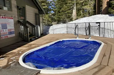 a hot tub sitting in the middle of a yard at Crestview 48 in Mammoth Lakes