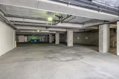 an empty parking lot in an empty parking garage at Mammoth Green #210 - Nearly Ski-in Ski-Out 2 Bedroom 2 Bath, Sleeps 6 on Golf Course in Mammoth Lakes