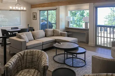 a living room with a couch and a table at Towering Pine in Incline in Incline Village
