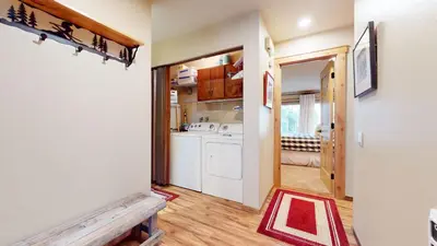 a kitchen with a washer and dryer at Snowcreek I #47 condo in Mammoth Lakes