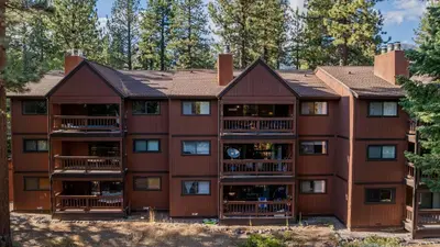 an exterior view of a large apartment building at Walk to Lake DiningShops 5mins to Ski Resort Incline Paradise by AvantStay in Incline Village