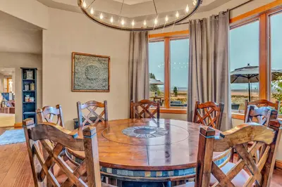 a dining room with a table and chairs at Secluded Tahoe Retreat by Northstar with Hot Tub in Truckee