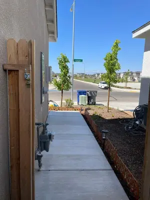 a walkway outside of a building with a street at Cozy-Quiet-Spacious Guest Suite in Fresno Clovis California in Fresno
