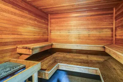 an empty wooden sauna with a pool in it at 5 Mi to Northstar Skiing Bear Den Home with Decks in Kings Beach