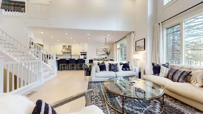 a living room with a couch and a table at Timbers #12 townhouse in Mammoth Lakes