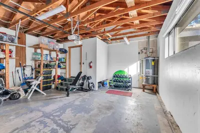 a gym with chairs and exercise equipment in a room at Bright Tahoe Home with Private Backyard Near Beach in Tahoe City