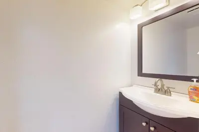 a bathroom with a sink and a mirror at Keys to Paradise in South Lake Tahoe