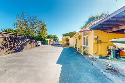 a street with a house and a boat on it at Morgan Hill Couples Gem Villa in the Vineyards in Morgan Hill
