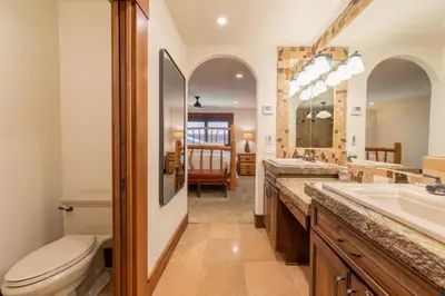 a bathroom with a toilet and a sink at Serenity at Dollar Point - Luxurious 4BR w Private Backyard in Tahoe City