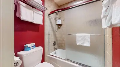 a bathroom with a white toilet and a shower at Snowcreek II #279 condo in Mammoth Lakes