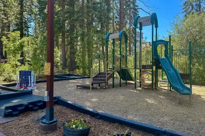 a playground with a slide in a park at Gold Bend Getaway in Truckee