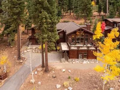 an aerial view of a log house in the woods at Northstar Ski-In Ski-Out with Valley Views in Ponderosa Fairway Estates