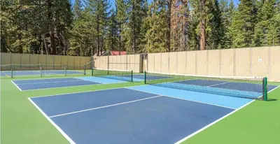 two tennis courts on a tennis court at Tahoe City Retreat Forest Views and Fireplace in Tahoe City