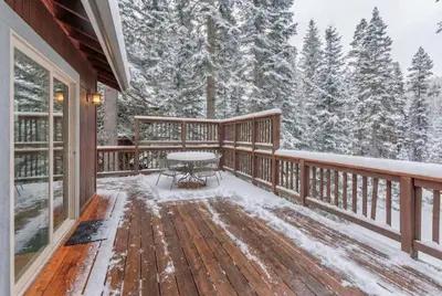 a deck with a table and snow on it at Tahoe Retreat with Scenic Views and Spacious Deck in Tahoe Vista