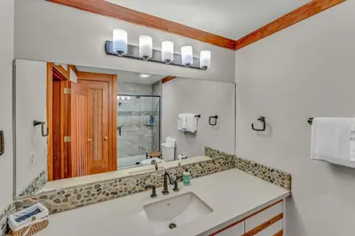 a bathroom with a sink and a mirror at 3-Level Getaway Minutes from Lake Tahoe in Tahoe City