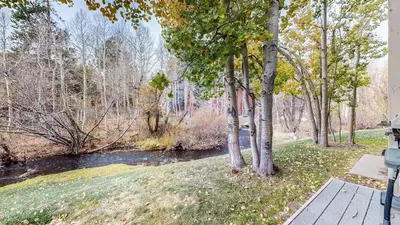 a view of a river from a house at Snowcreek IV #545 condo in Mammoth Lakes