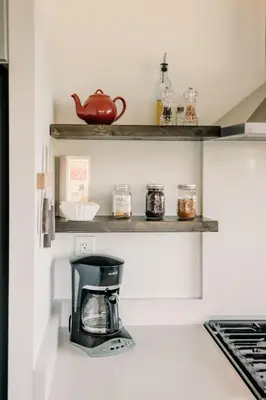a kitchen with a coffee maker on a counter at Romantic Yosemite Retreat - Private Zen Hot Tub in Mariposa