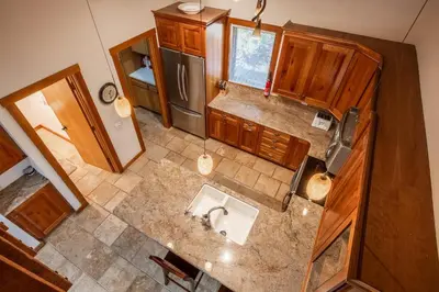 an overhead view of a kitchen with a sink at Snowcreek #482 - Updated ! 3 Bedroom + Loft, 2 Bathroom, Sleeps 10! in Mammoth Lakes