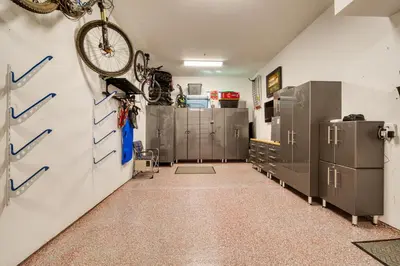 a room with a bike hanging on the wall at Lightning Run at Palisades - 3 BR 3 BA Condo steps to Palisades Tahoe- Ski Shuttle in Olympic Valley