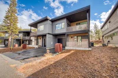 an exterior view of a house at Lightning Run at Palisades - 3 BR 3 BA Condo steps to Palisades Tahoe- Ski Shuttle in Olympic Valley