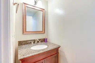 a bathroom with a sink and a mirror at 12 Mi to Folsom Historic District NorCal Getaway in Fair Oaks