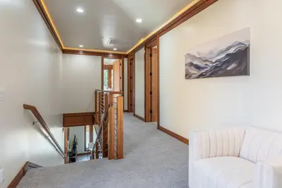 a living room with a couch and a table at Obsidian 170 in Mammoth Lakes