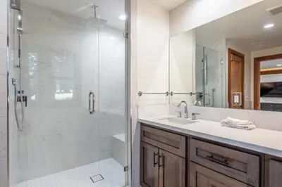 a bathroom with a shower and a sink at Obsidian 170 in Mammoth Lakes