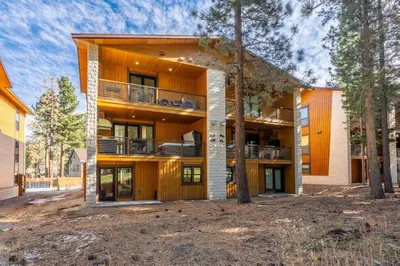 an exterior view of a building with trees at Obsidian 170 in Mammoth Lakes