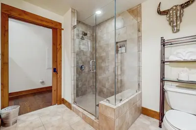 a bathroom with a shower and a toilet at Northstar Escape in Kingswood Estates