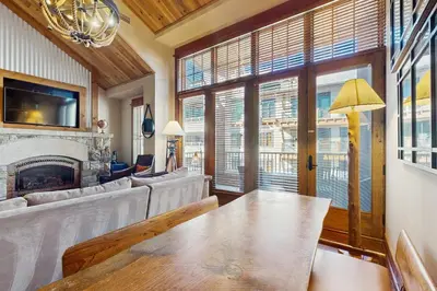 a living room with a couch and a fireplace at Northstar Getaway in Truckee