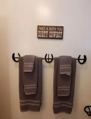 two towels hanging on a towel rack in a bathroom at Jordan Creek Ranch in Groveland