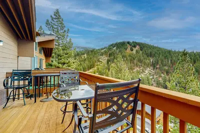 a balcony with a table and chairs and a view at Bear-foot Retreat in Incline Village