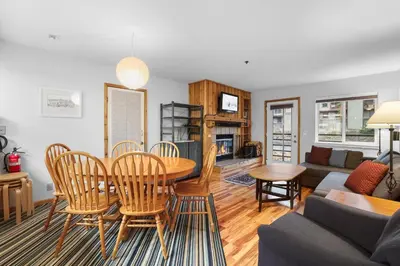 a living room with a table and chairs at Kirkwood Retreat - 2 Bedroom Condo condo in Kirkwood