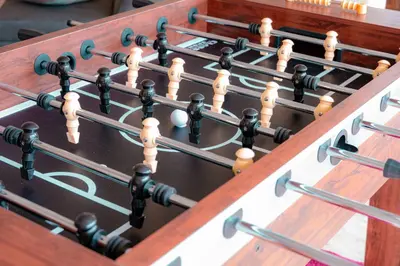 a close up of an old wooden chess board at Heaven Heights - HotTub, Pet Friendly, EV Outlet, Pool Table, Game Room, BBQ, FirePit, Library in Oakhurst