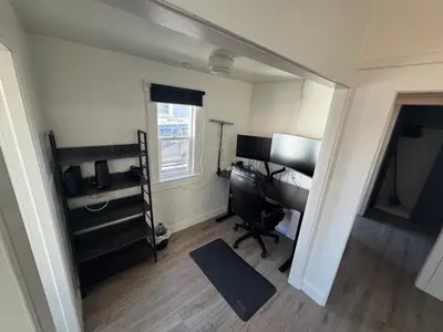 a recording room with a piano and a window at Midtown Hideaway 1 BR Nest in Reno