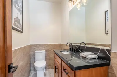 a bathroom with a sink and a toilet at Obsidian 210 in Mammoth Lakes