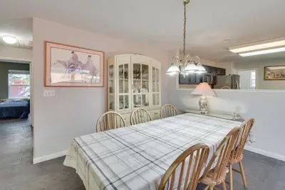 a kitchen and dining room with a table and chairs at 4 Mi to San Joaquin River Peaceful Patterson Home in Patterson