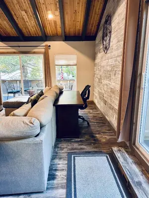a living room with a couch and a desk at Lake Tahoe Incline Beach Ski Pool Pets Casino in Incline Village