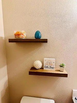 a shelf above a toilet in a bathroom at Lake Tahoe Incline Beach Ski Pool Pets Casino in Incline Village