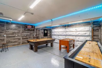 a room with two ping pong tables in it at Modern 3-Bedroom Escape in Northwest Reno in Reno