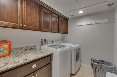a laundry room with a washer and dryer at 3987 - Upscale Townhouse Walk to Heavenly, Casino and Beach in South Lake Tahoe