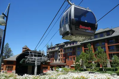 a gondola ride in front of a building at 3987 - Upscale Townhouse Walk to Heavenly, Casino and Beach in South Lake Tahoe