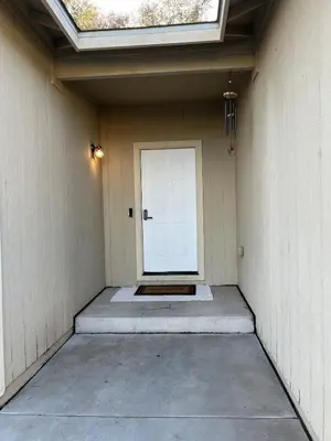 a garage with a white door and a window at Cozy House in Fallon- 3BedRoom, 2BathRooms in Fallon