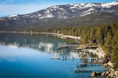 a view of a lake with mountains in the background at The Pines Chalet in Incline Village